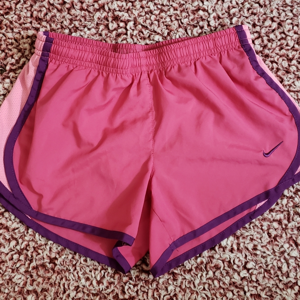 Girls pink Nike shorts.